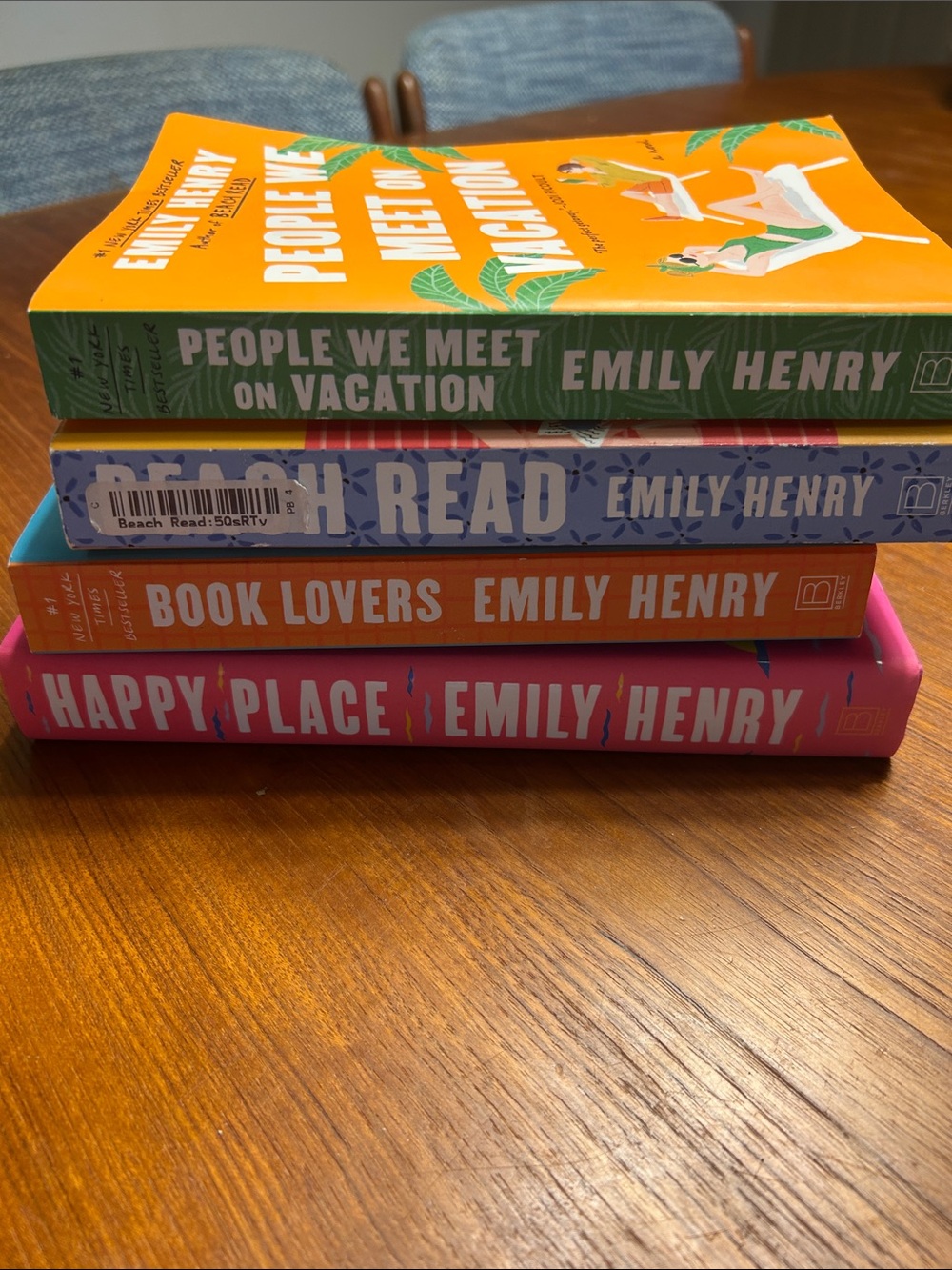 Emily Henry Paperback and Hardback Stack — Bright Orange, Pink, Green, Blue
